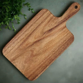 Wooden cutting board with handle and natural wood grain